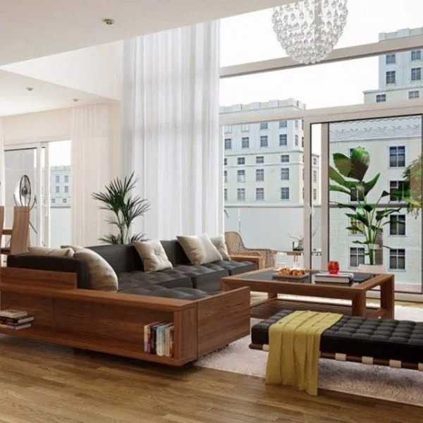 Không gian phòng khách với bàn và sofa gỗ óc chó