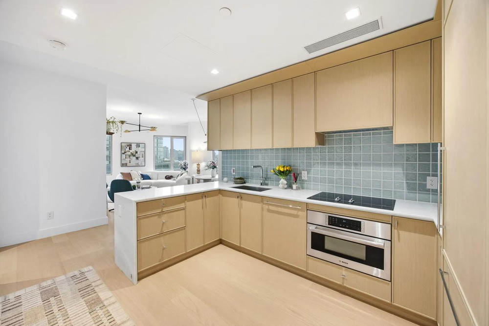 15+ Mẫu Nội Thất Chung Cư Vinhomes Smart City Đẹp, Hiện Đại Và Tối Ưu Diện Tích Mẫu phòng bếp chữ L hiện đại, tối ưu công năng